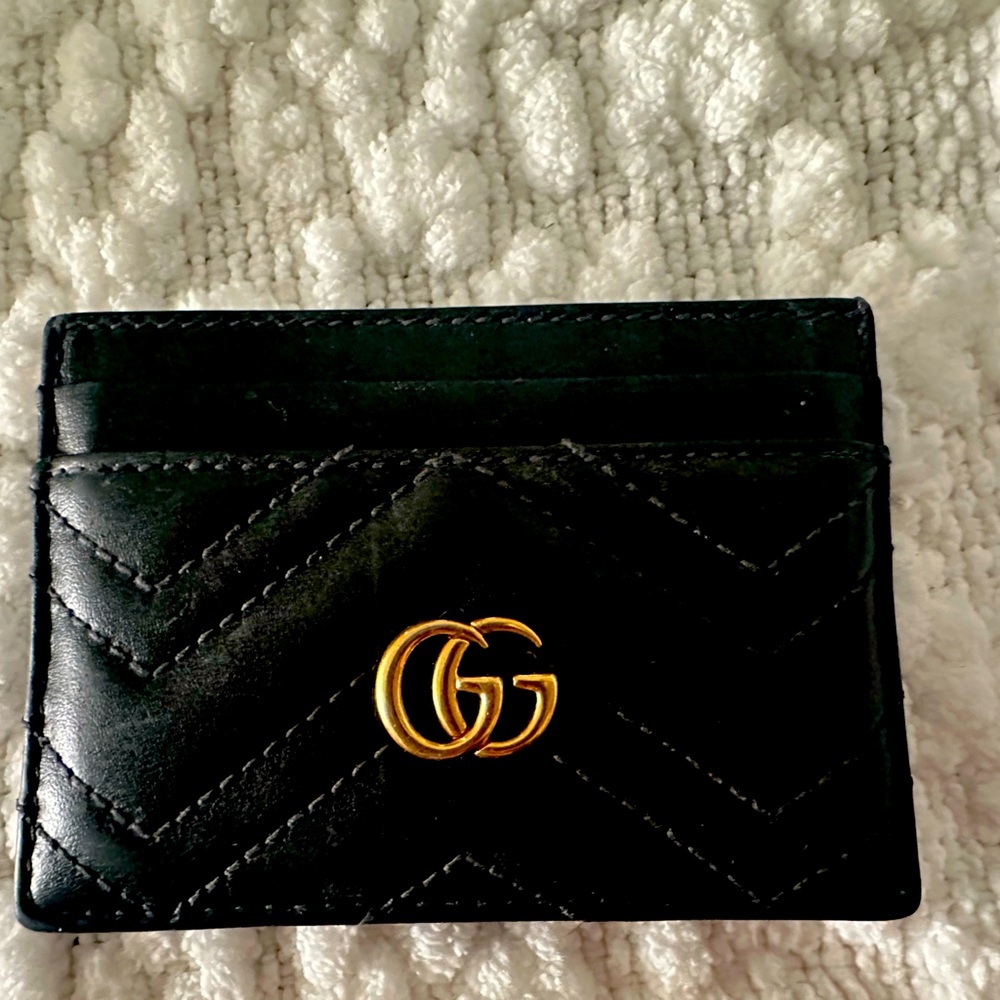 Gucci card holder coin slot 
Black leather